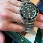 Rolex GMT-Master II Black 16710 Year 1989 - 2007 complete full set original box papers booklets and tags with stickers and warranty card