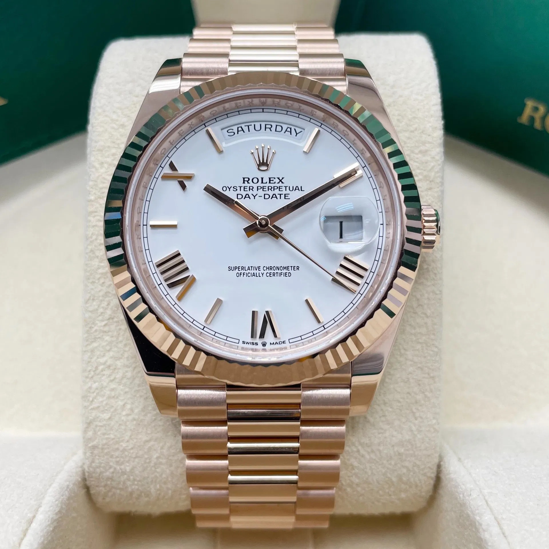 2024 Rolex Day-Date 40 Rose Gold / Fluted / White / Roman complete full set brand new.
