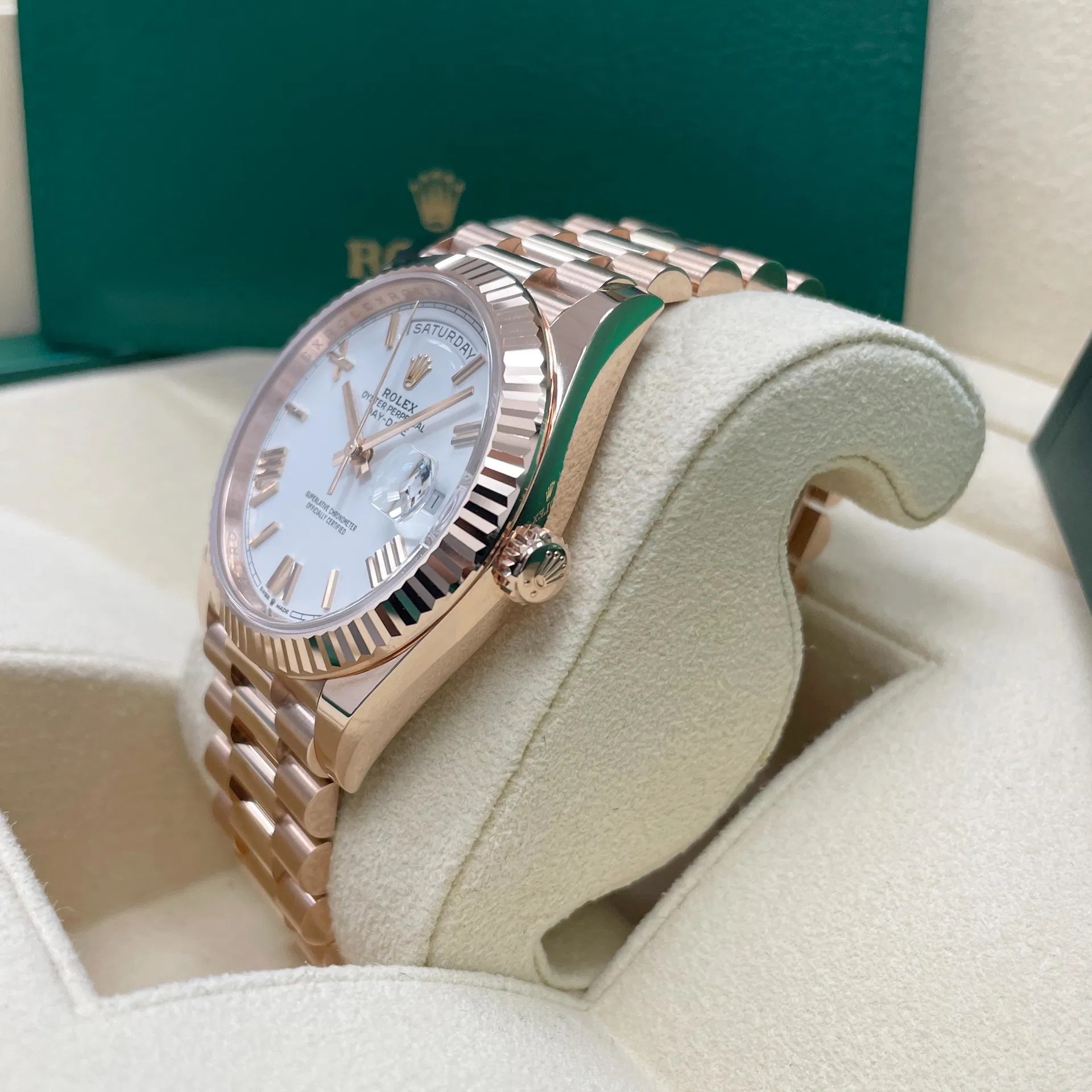 2024 Rolex Day-Date 40 Rose Gold / Fluted / White / Roman complete full set brand new.