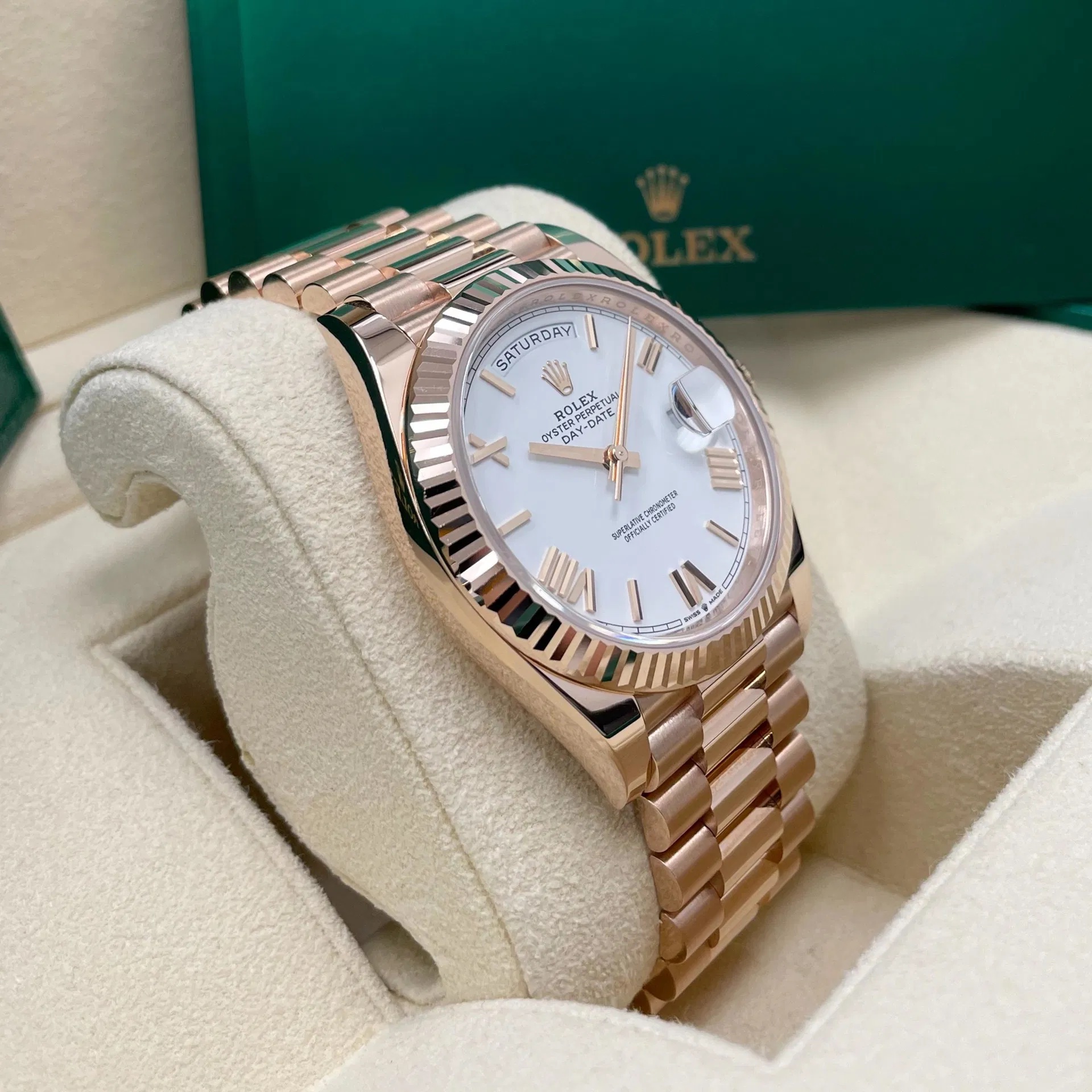 2024 Rolex Day-Date 40 Rose Gold / Fluted / White / Roman complete full set brand new.