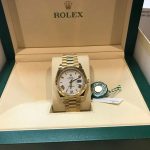 2022 Rolex Day-Date 40 Yellow Gold / Fluted / White / Roman complete full set like new.